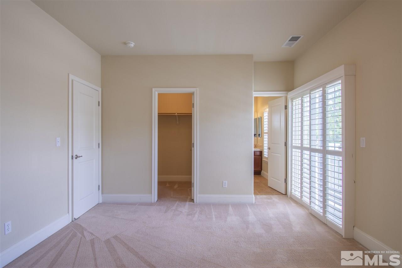 1350 Waterloo Drive Reno, NV 89509 - Photo 13 of 19 an empty room with windows and closet