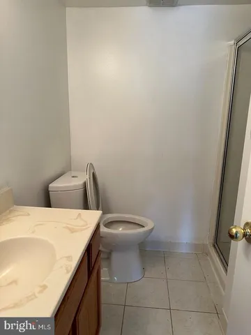 a bathroom with a sink and toilet