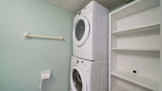 a bathroom with a toilet a sink and a mirror