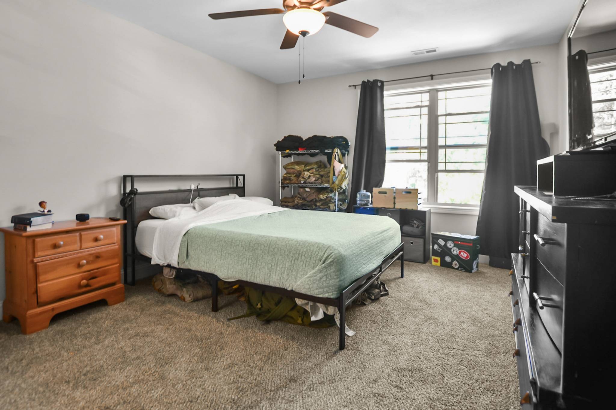 60 Cave Springs Road, Unit B Clarksville, TN 37042 - Photo 12 of 16 a bedroom with a bed and a tv