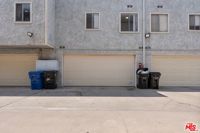 a bathroom with a granite countertop sink