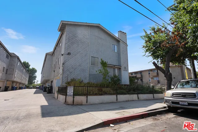 a view of a street in the back of a building