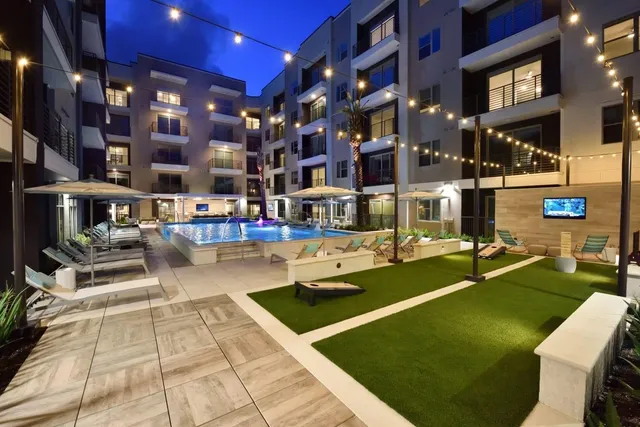 a view of a building with sitting area