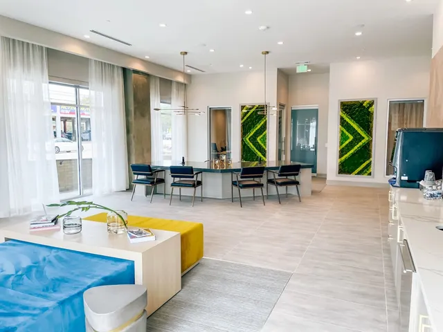 a view of a living room and dining room