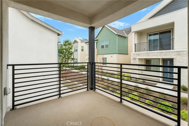 a view of a house with a fence