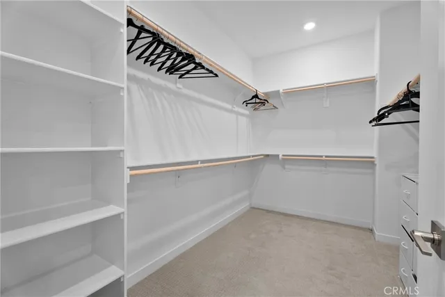 a view of an empty walk in closet