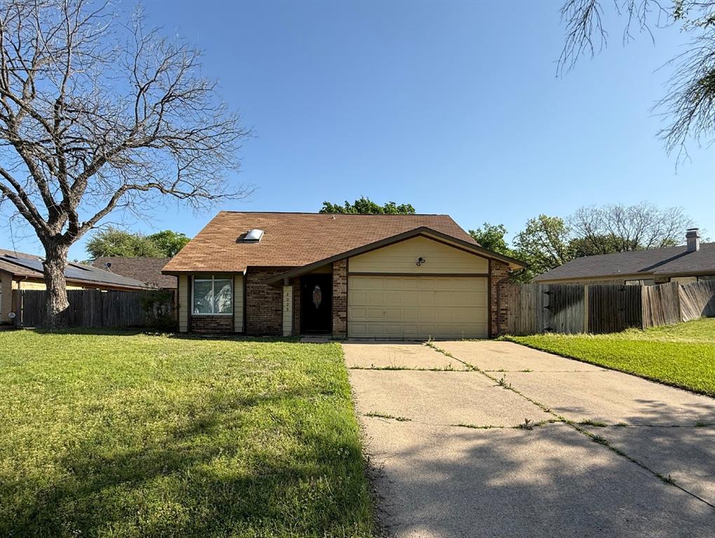 3005 Meandering Way Bedford, TX 76021 - Photo 1 of 22 a house with yard in front of it