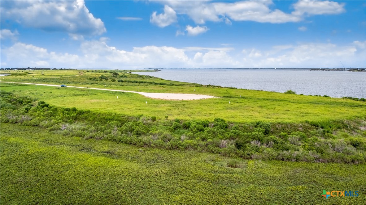 Lot 362 Evening Point Port Port Lavaca, TX 77979 - Photo 3 of 7 a view of an ocean from a yard