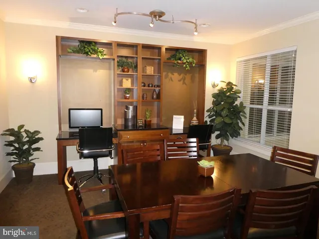 a view of a workspace with furniture