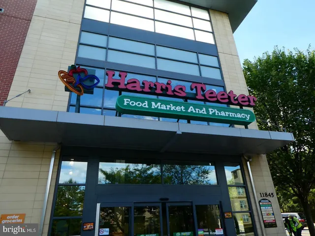 a street sign on a brick wall