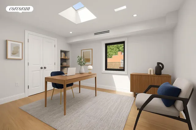 a living room with furniture a rug and a window