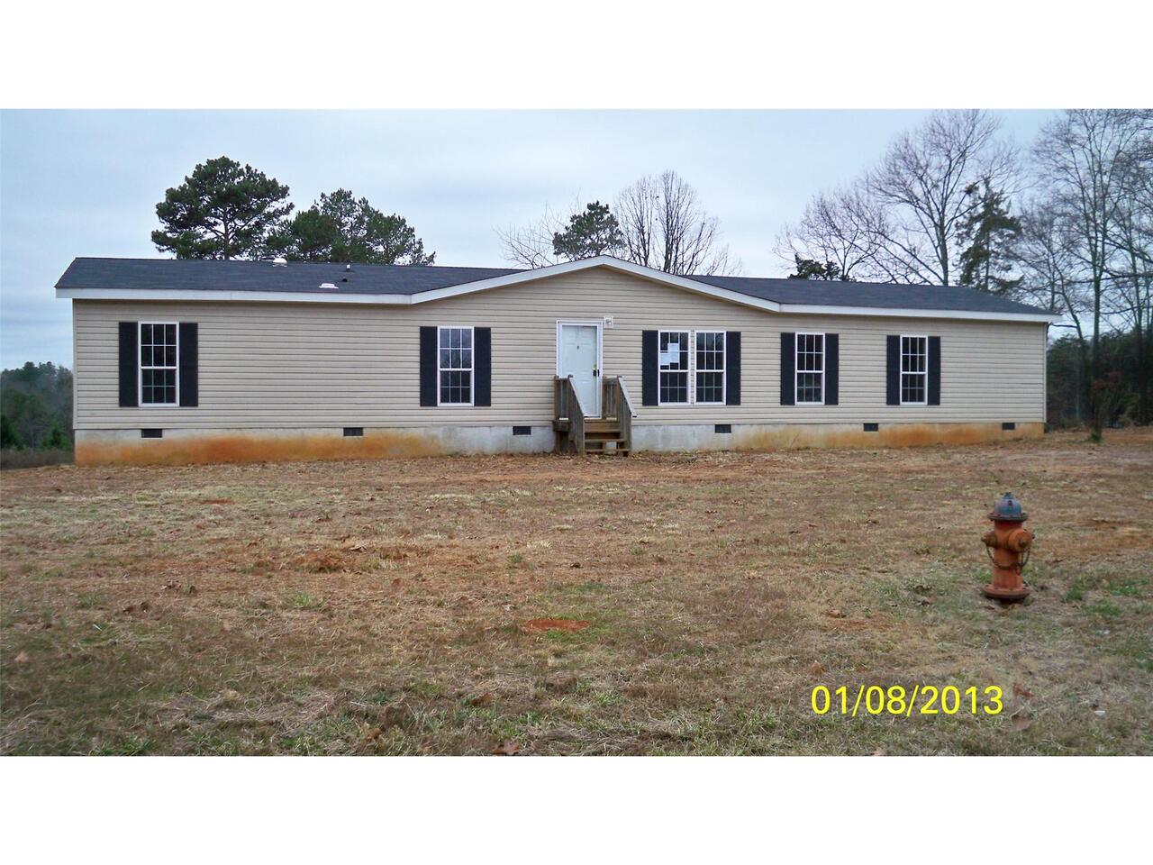 1708 Defore Road Toccoa, GA 30577 - Photo 1 of 1 a view of a house with a yard