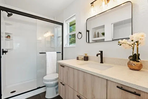 a view of a backyard with a small cabin