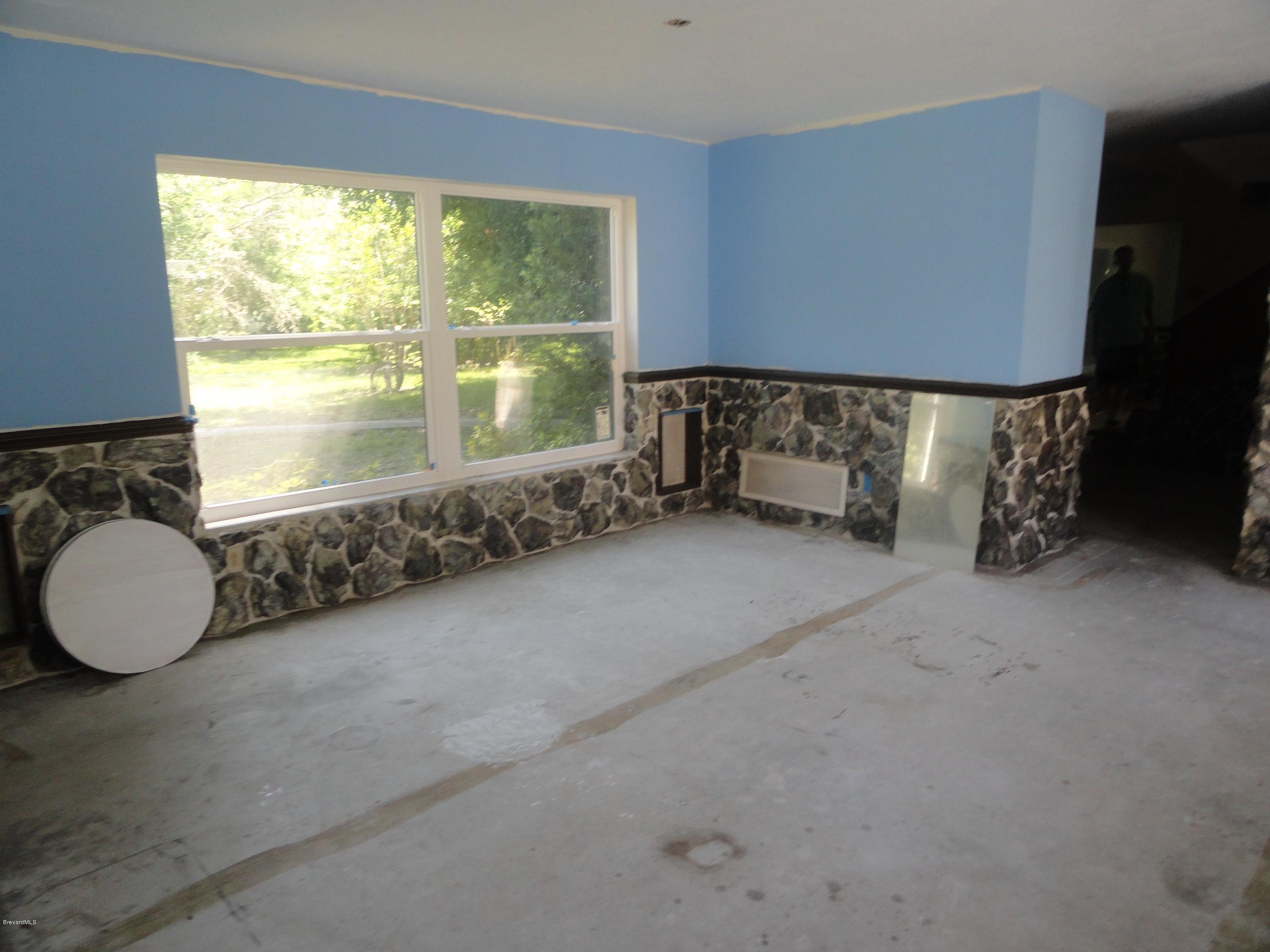 4350 Pinewood Road Melbourne, FL 32934 - Photo 4 of 43 FORMAL DINING ROOM