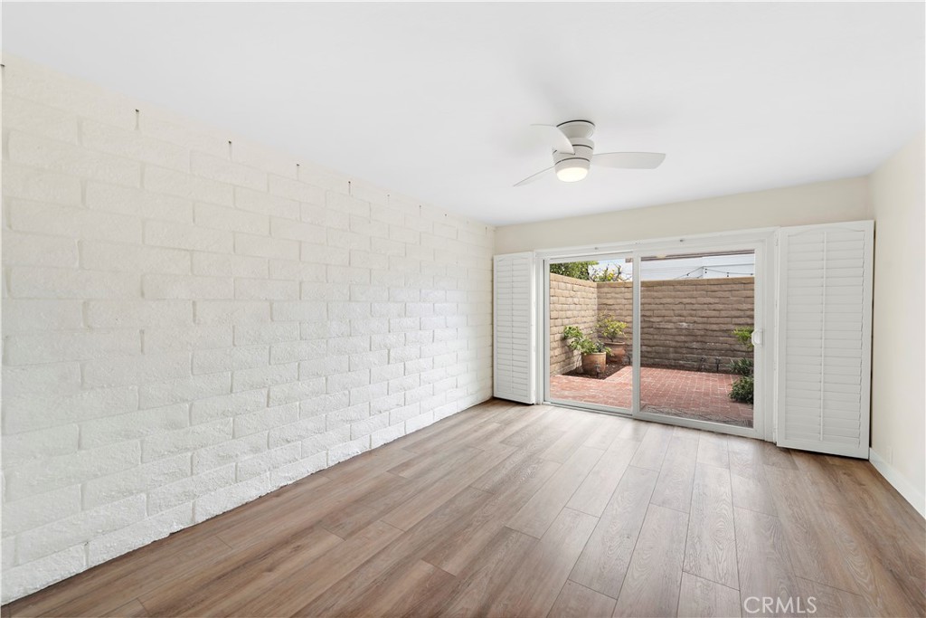 23892 Taranto Bay Dana Point, CA 92629 - Photo 15 of 54 wooden floor in an empty room with a window