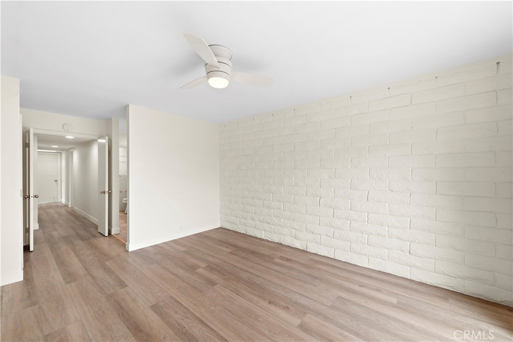 23892 Taranto Bay Dana Point, CA 92629 - Photo 16 of 54 a view of a room with wooden floor