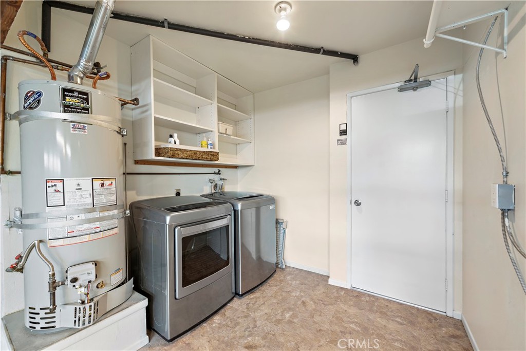 23892 Taranto Bay Dana Point, CA 92629 - Photo 24 of 54 a view of a kitchen with washer and dryer