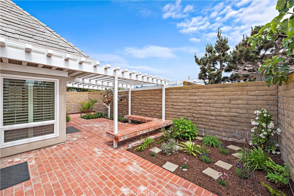 23892 Taranto Bay Dana Point, CA 92629 - Photo 29 of 54 a view of a backyard with sitting area