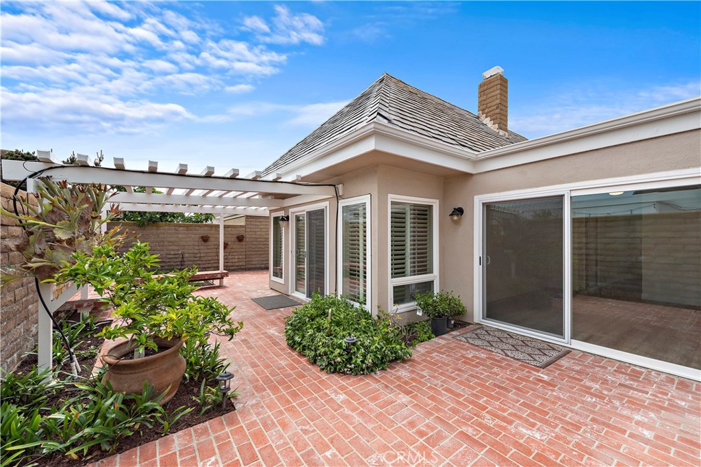 23892 Taranto Bay Dana Point, CA 92629 - Photo 30 of 54 a front view of a house with garden