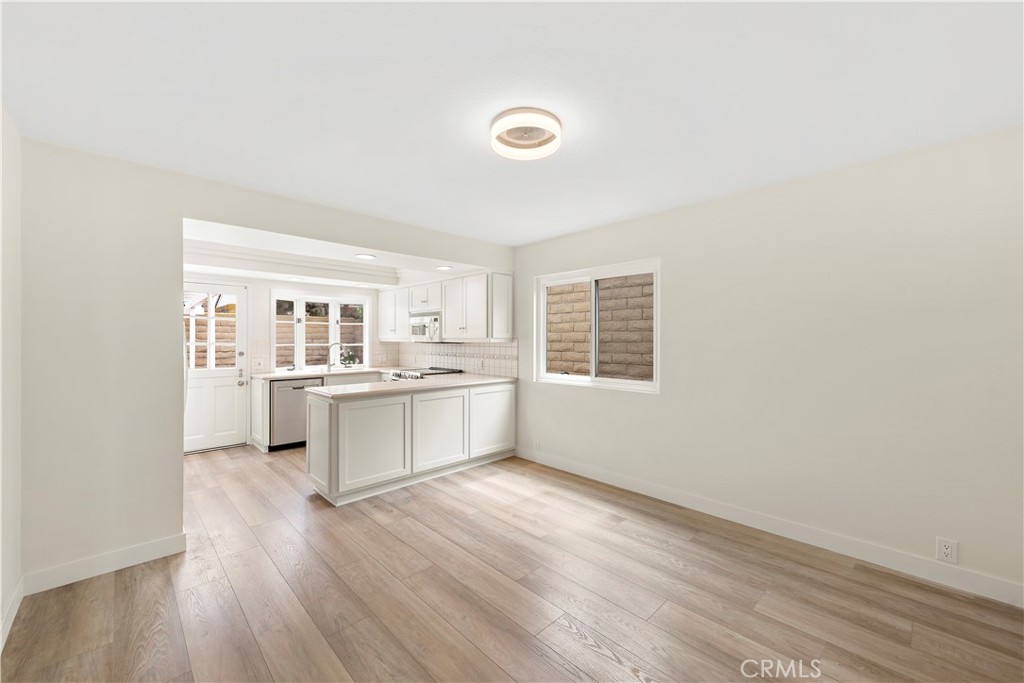 23892 Taranto Bay Dana Point, CA 92629 - Photo 9 of 54 a view of a kitchen with electric appliances
