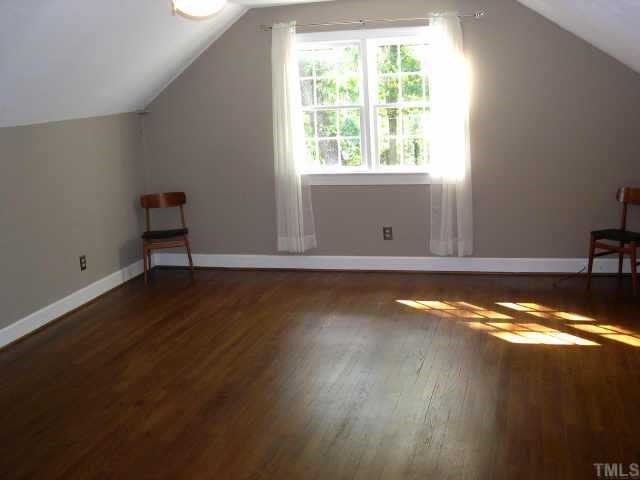 4201 Oak Park Road Raleigh, NC 27612 - Photo 8 of 12 a view of room with window and wooden floor