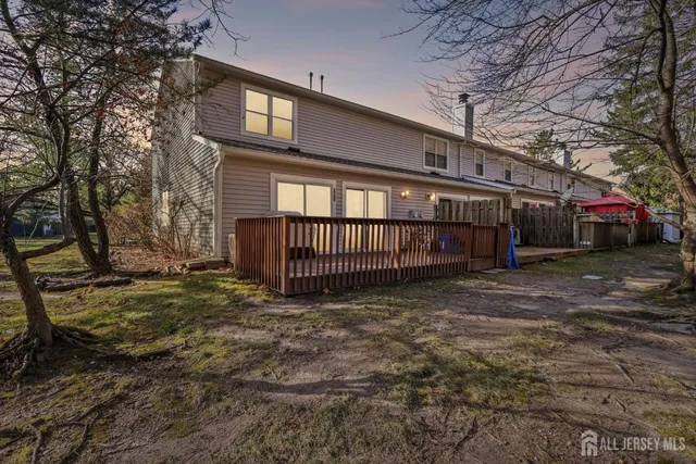 a picture of a bathroom with a shower