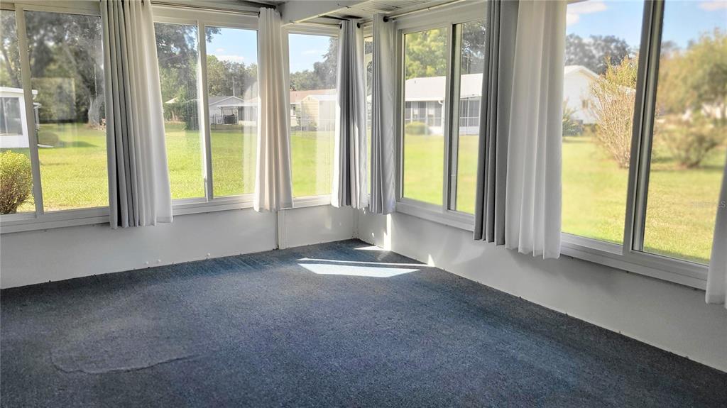 11215 Southwest 63rd Terrace Road Ocala, FL 34476 - Photo 12 of 13 a view of an empty room and window