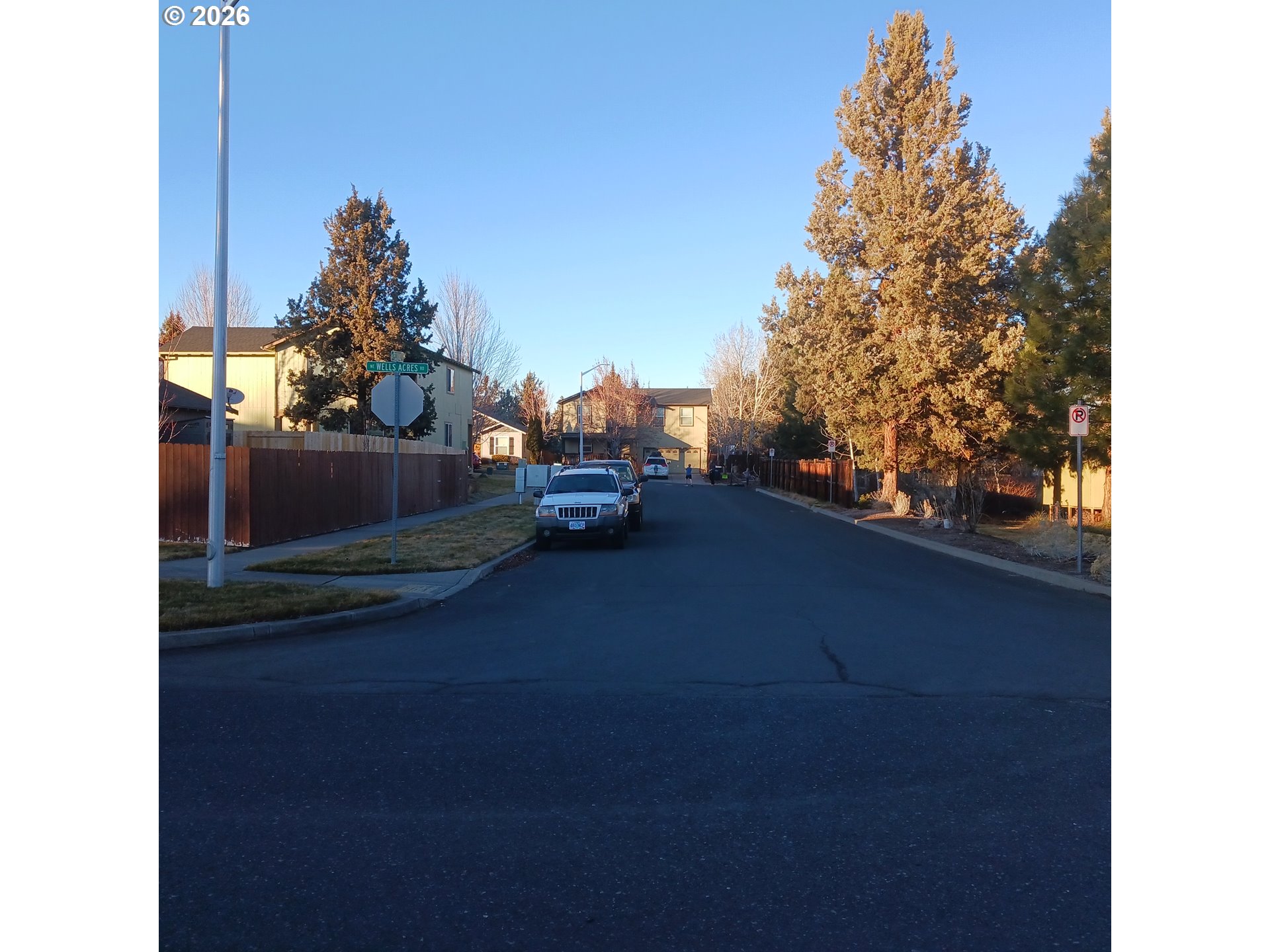 3151 Northeast Wells Acres Road Bend, OR 97701 - Photo 15 of 16 a car parked on the side of a road