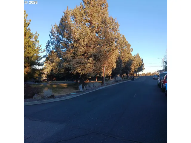 a view of a yard from a balcony