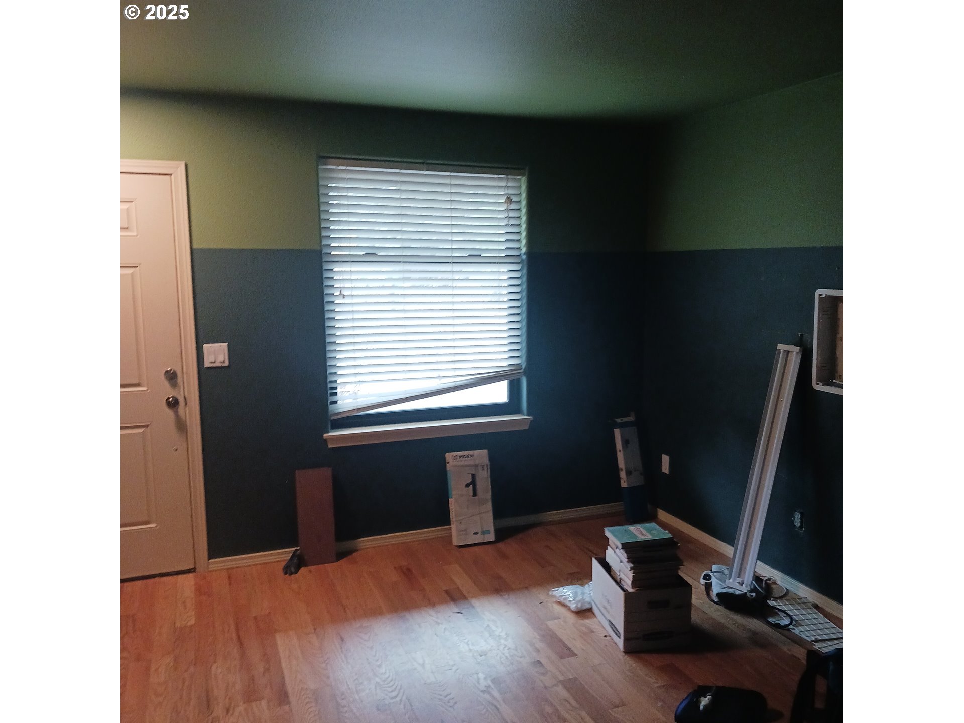 3151 Northeast Wells Acres Road Bend, OR 97701 - Photo 4 of 16 a bedroom with a bed and a window