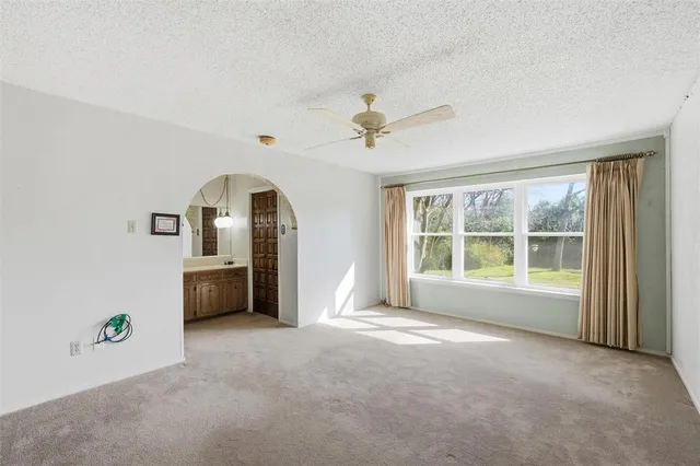 a view of livingroom with furniture and window