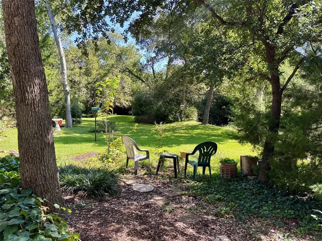 a view of a golf course with a lake