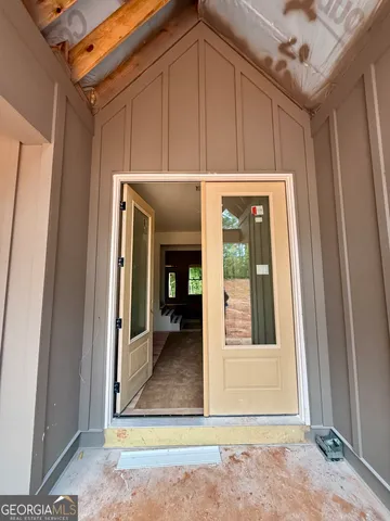 a view of a room that has a large window
