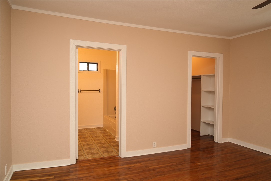 641 Naples Street Corpus Christi, TX 78404 - Photo 12 of 29 a view of empty room with wooden floor