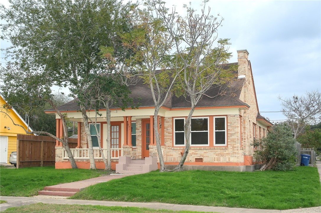641 Naples Street Corpus Christi, TX 78404 - Photo 2 of 29 a view of a house with a yard and sitting area