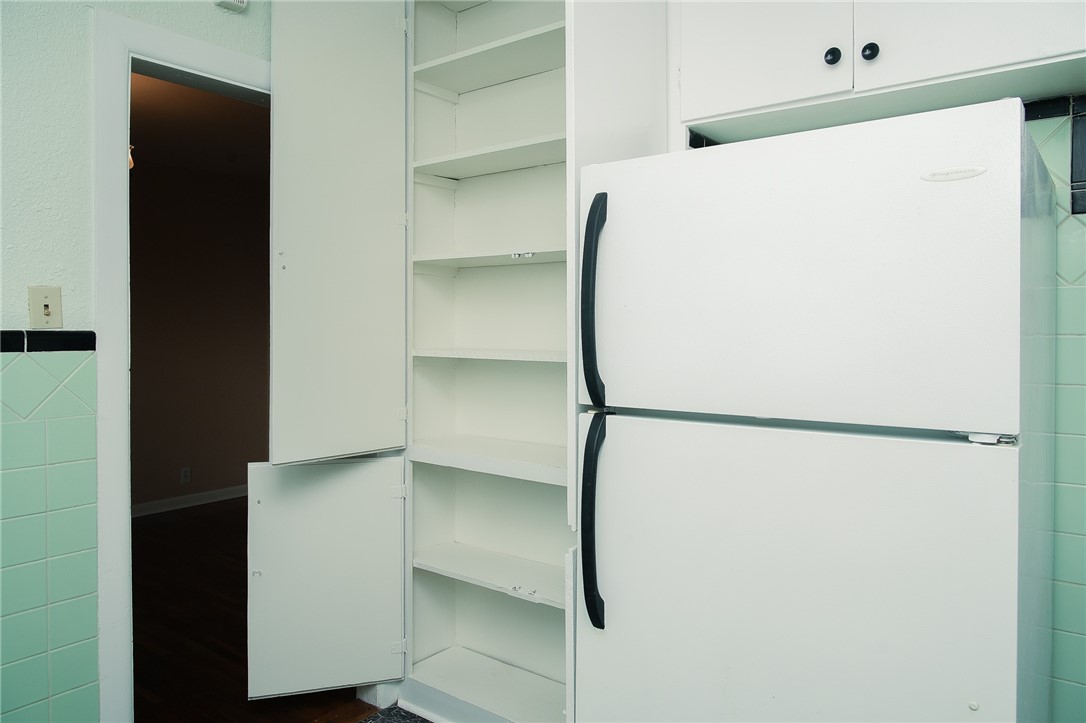 641 Naples Street Corpus Christi, TX 78404 - Photo 23 of 29 a view of walk in closet with empty racks