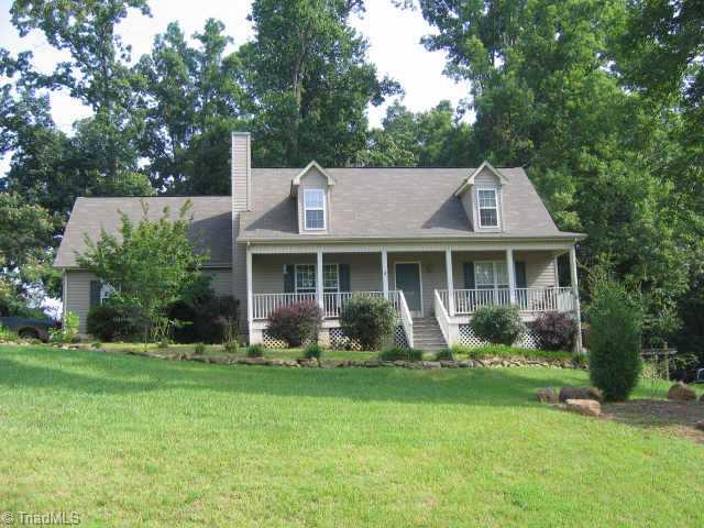 7922 Daltonshire Drive Oak Ridge, NC 27310 - Photo 1 of 8 Exterior Front.