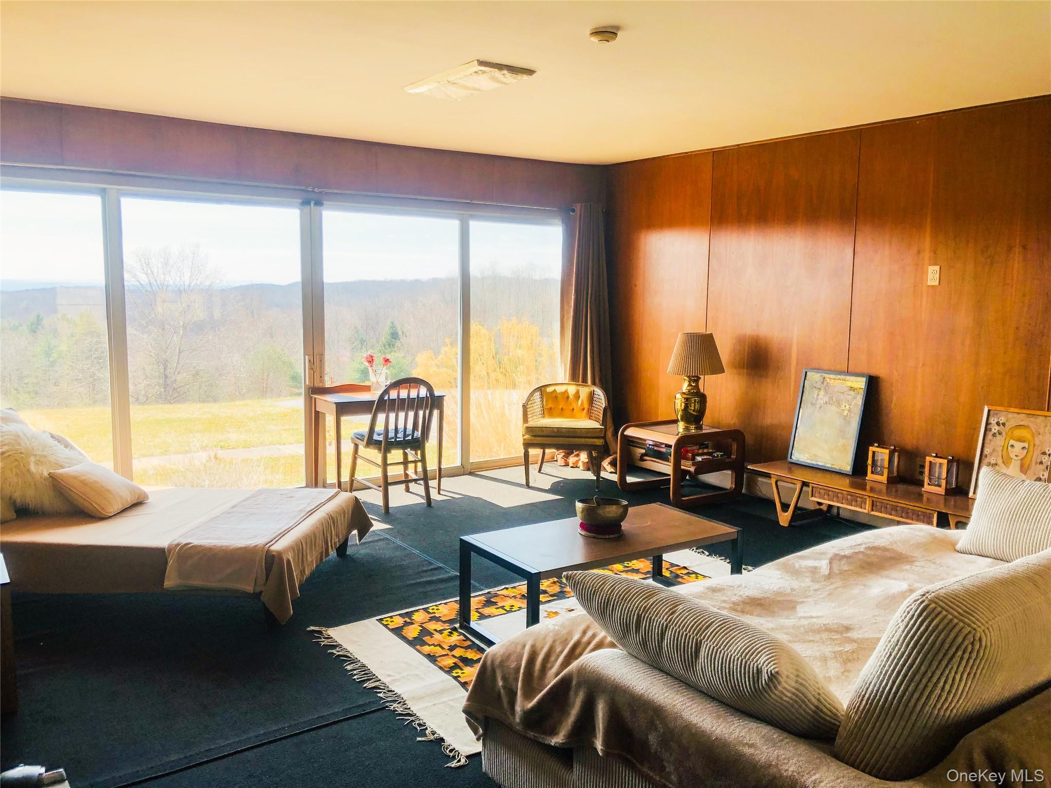 68-78 Ridge Road Clinton Corners, NY 12514 - Photo 22 of 50 a living room with furniture and a large window