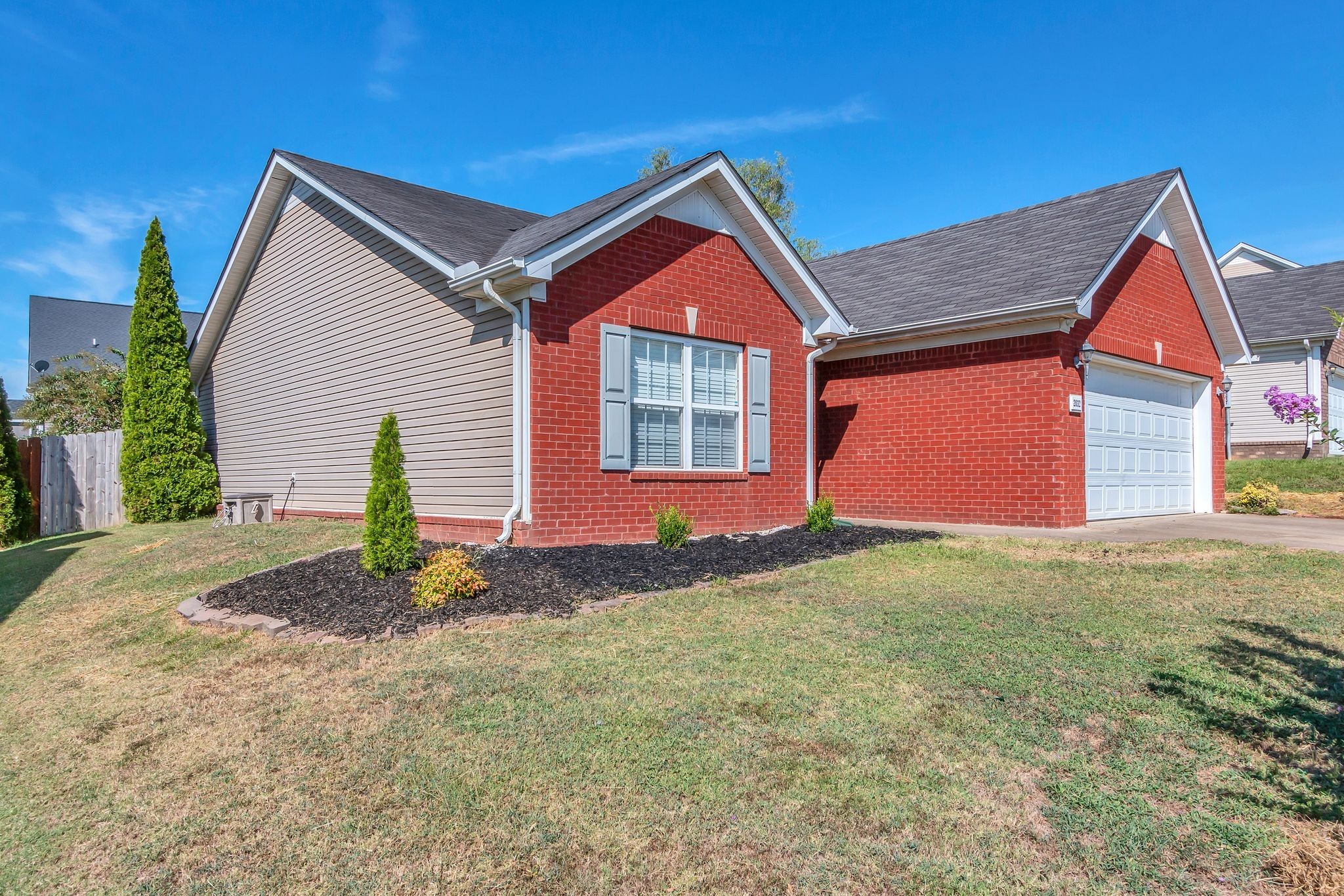 2032 Red Jacket Trace Spring Hill, TN 37174 - Photo 3 of 33 a house view with a backyard space