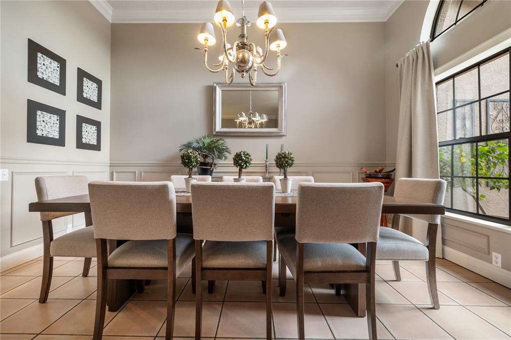 3372 Brian Road South Palm Harbor, FL 34685 - Photo 7 of 45 a dining room with furniture a window and a chandelier