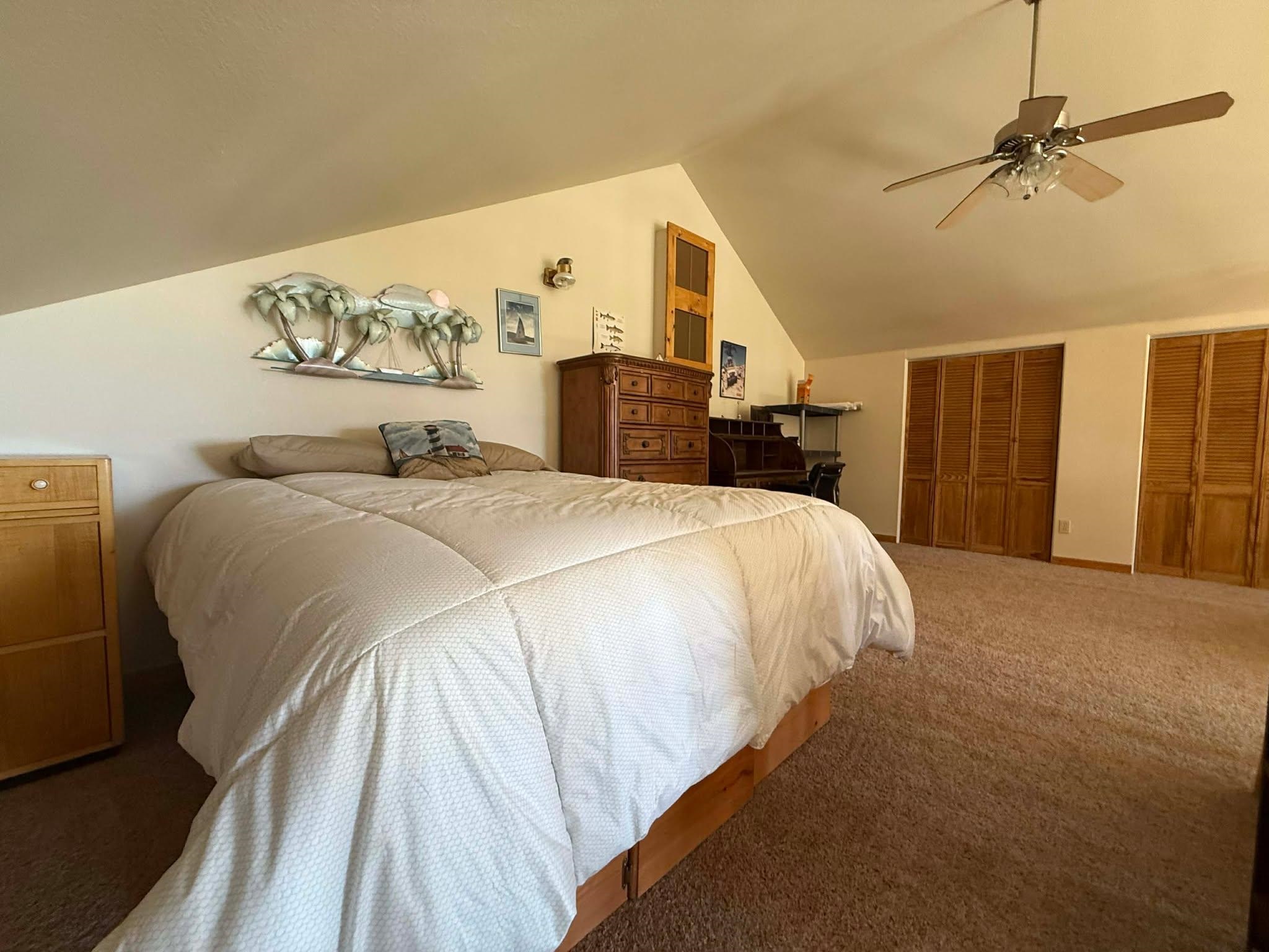 93 Juniper Road Beckwourth, CA 96129 - Photo 17 of 35 a bed sitting in a bedroom and chair