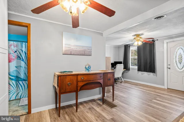 a room with furniture and wooden floor