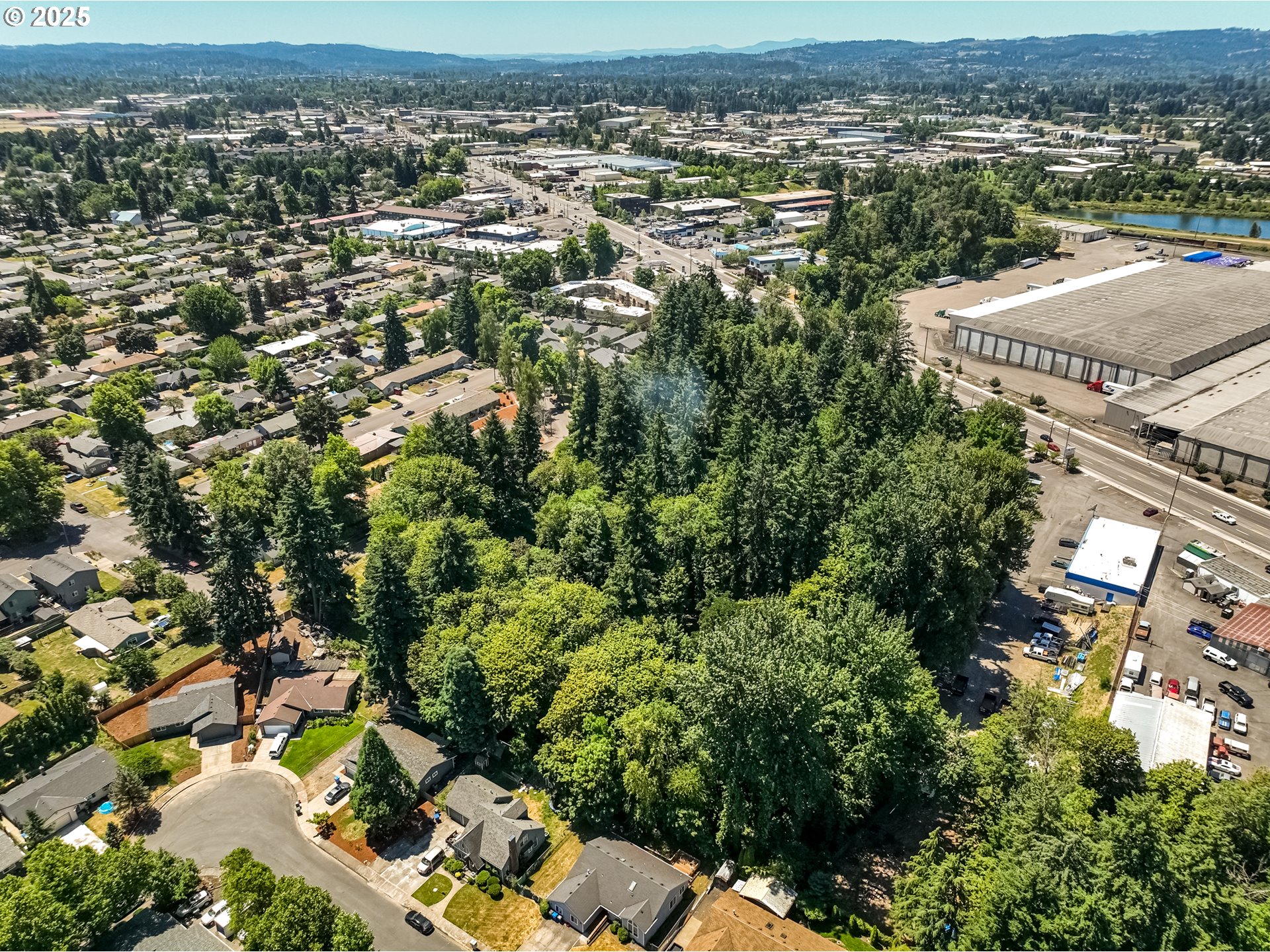 2557 Hummingbird Lane Northeast Salem, OR 97301 - Photo 4 of 7 an aerial view of a city with lots of residential buildings