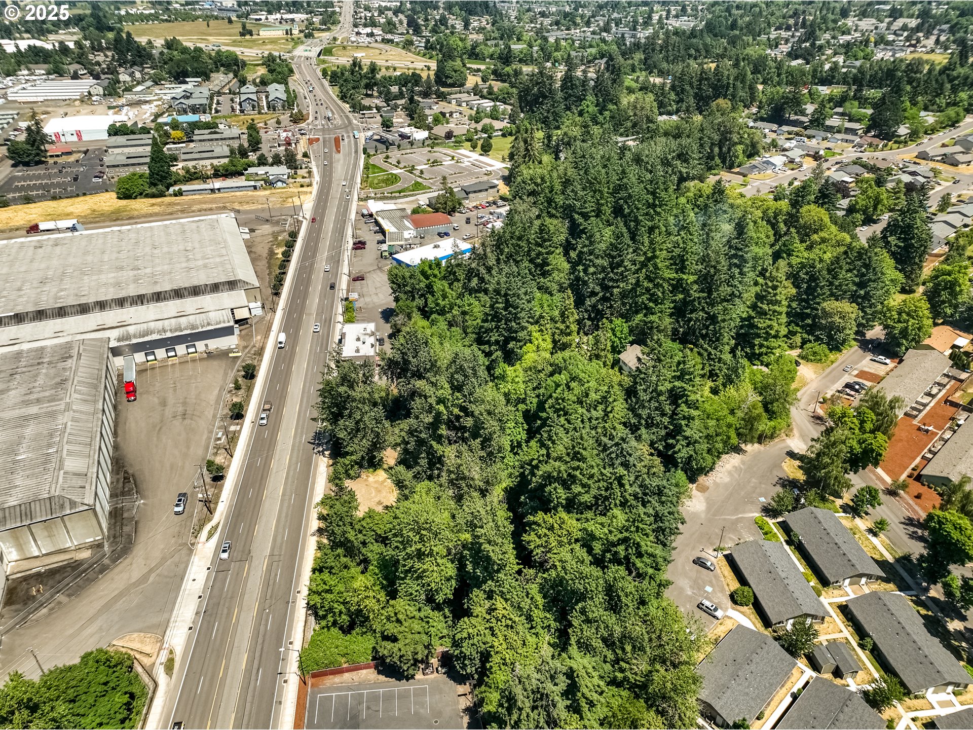 2557 Hummingbird Lane Northeast Salem, OR 97301 - Photo 6 of 7 an aerial view of residential houses with outdoor space