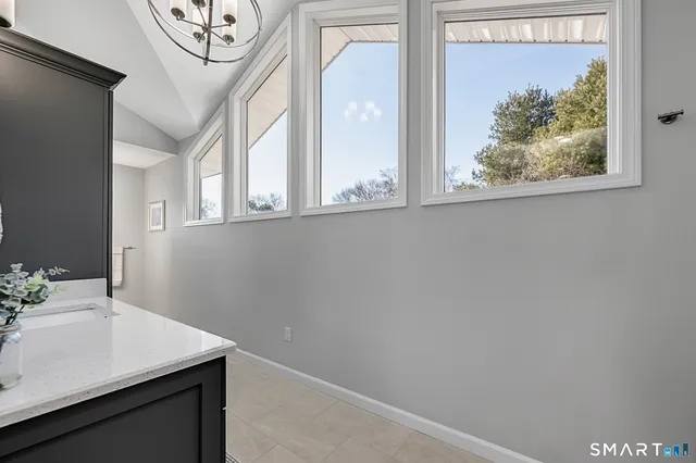 a view of a hallway with washer and dryer