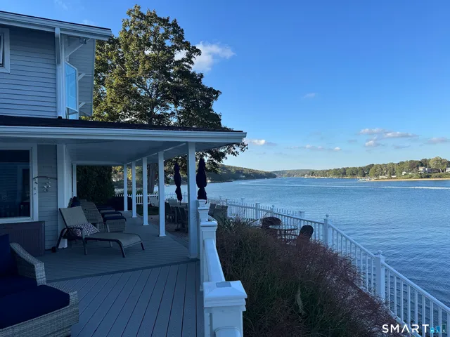 a view of house with a roof deck