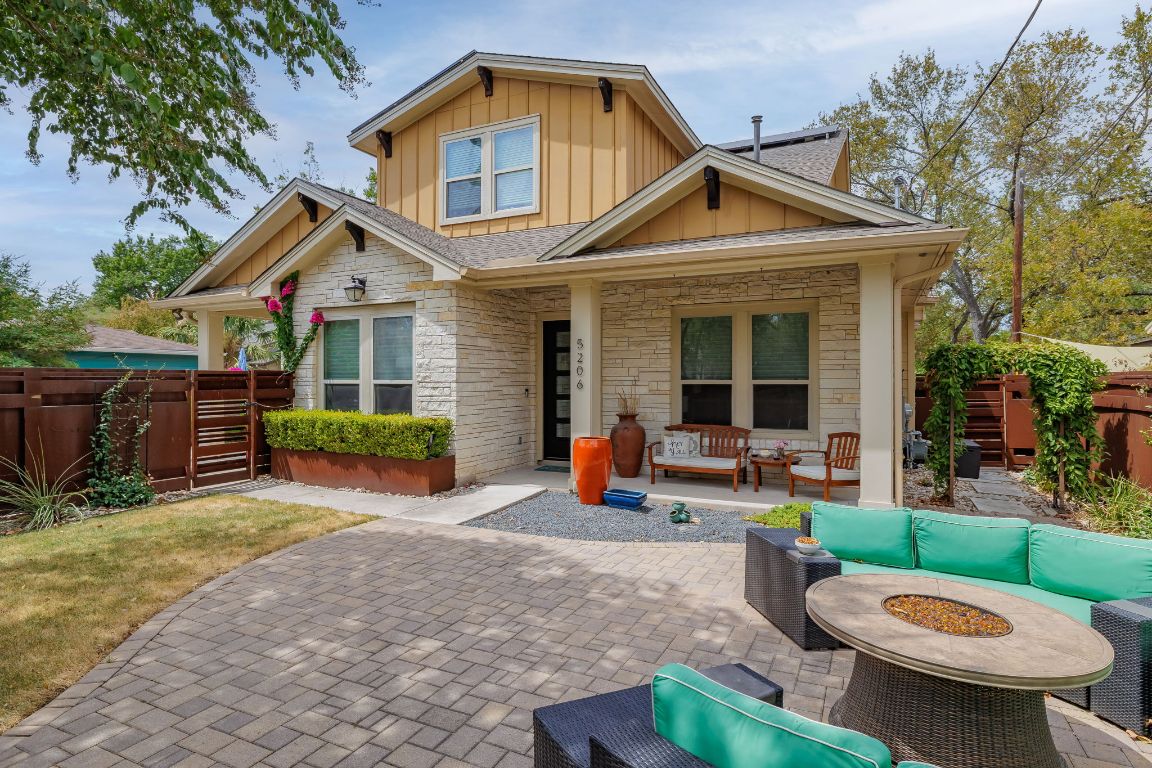 5206 Woodrow Avenue Austin, TX 78756 - Photo 1 of 30 Private front yard courtyard is perfect for entertaining!
