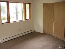 1256 Poplarwood Road Wind Gap, PA 18091 - Photo 8 of 21 an empty room with a window