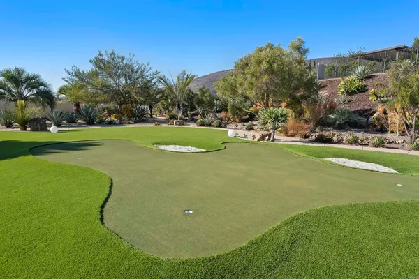 a view of a golf course with a garden