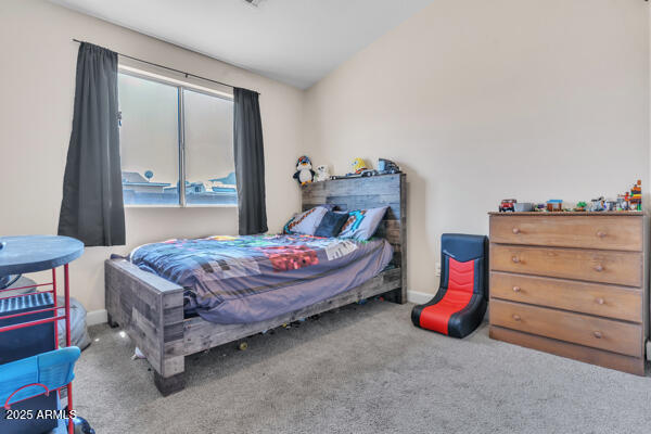 138 North Signal Butte Road Apache Junction, AZ 85120 - Photo 14 of 25 a bedroom with a bed and a dresser